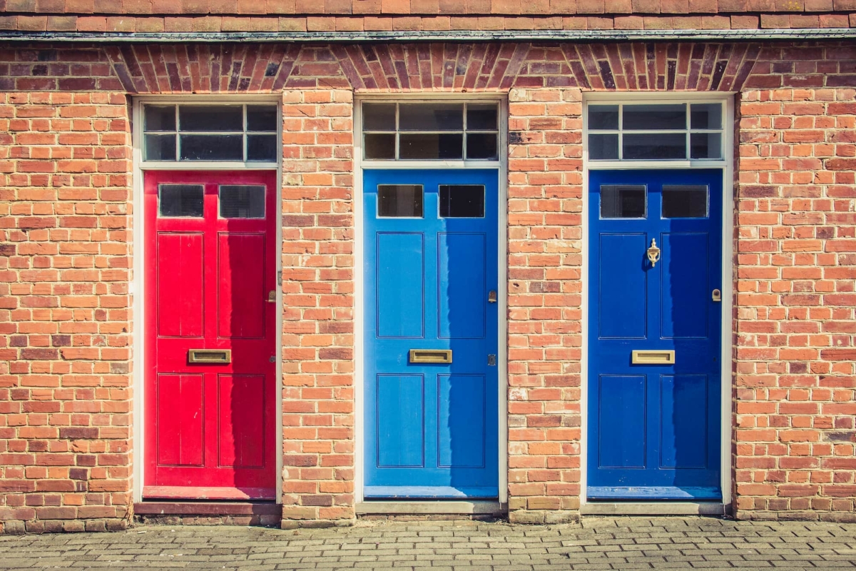 A red composite door, a light blue composite door and a dark blue composite door in Buckinghamshire,
