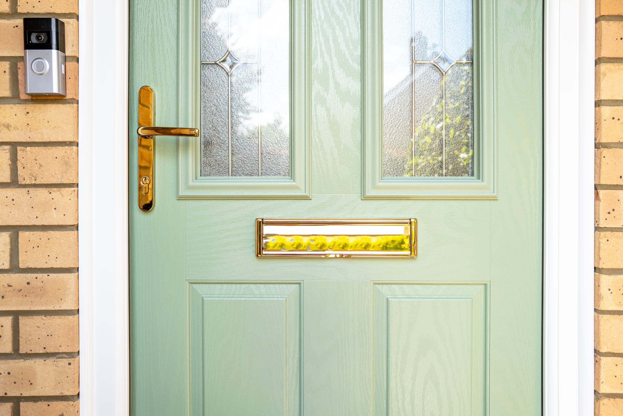 A green composite door for a home in Milton Keynes.